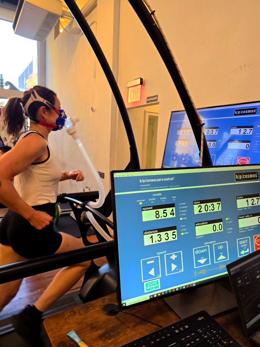 A client running on a treadmill during a VO₂ max test at California Longevity Clinic, wearing a metabolic testing mask